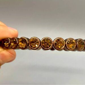 Designer Graziano signed vintage bangle w/infinity amber rhinestones